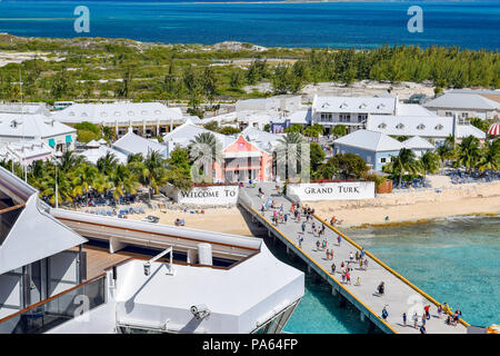 Grand Turk, Turks and Caicos Islands - April 03 2014: Passengers make their way from their Cruise Ship onto the island on arrival in Grand Turk in the Stock Photo