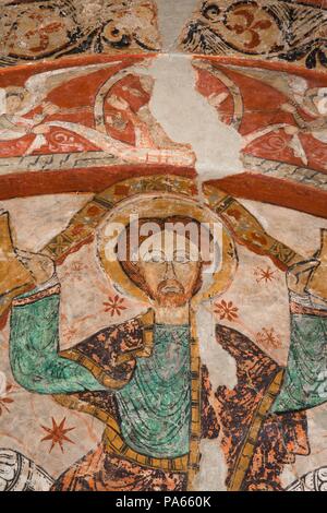 Mural painting in the absidal basin of the apse of the church of Santa María de Terrassa, representing Christ X century, Terrassa, Barcelona, Catalonia, Spain. Stock Photo
