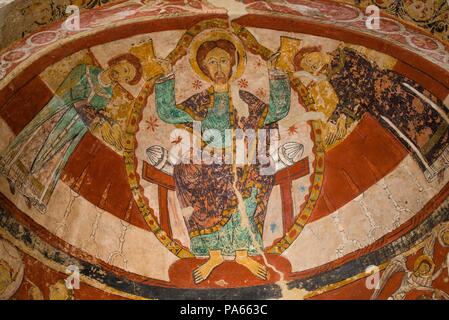 Mural painting in the absidal basin of the apse of the church of Santa María de Terrassa, representing Christ and two characters (possibly Tomás Becket and Edward Grim), Xth Century, Terrassa, Barcelona, Catalonia, Spain. Stock Photo