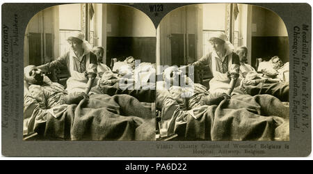 . English: Horizontal, sepia stereocard showing three men in hospital beds and one nurse. The man in the foreground has his head and hands wrapped in bandages. Keystone Stereograph number V18817. The title reads: 'Ghastly Glimpse of Wounded Belgians in Hospital, Antwerp, Belgium.' Title: 'The Horror of War - Ghastly Glimpse of Wounded.' . between circa 1914 and circa 1918 6 &quot;The Horror of War - Ghastly Glimpse of Wounded.&quot; Stock Photo