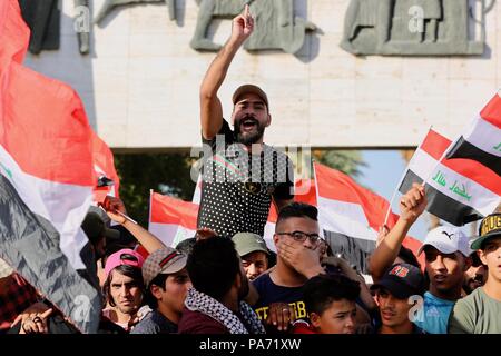 Baghdad, Iraq. 20th July, 2018. Protesters take part in a rally in Baghdad, Iraq, on July 20, 2018. Hundreds of angry protesters took to the streets in Baghdad and southern Iraqi provinces on Friday demanding jobs and better basic services. Credit: Khalil Dawood/Xinhua/Alamy Live News Stock Photo