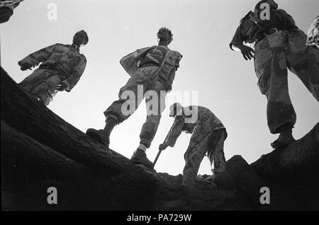 Tserona, Eritrea. 2nd Nov, 1999. In late afternoon, Eritrean soldier reinforce bunkers at the Egri Mikhail on the Ethopian-Eritrean border. The fighters rest during the day when the desert heat is too strong. Eritrea has 620 miles of hand-dug trenches along it's borders. Credit: Cheryl Hatch/ZUMAPRESS.com/Alamy Live News Stock Photo