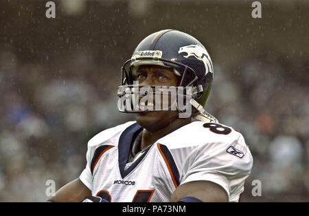 Denver Broncos tight end Shannon Sharpe leaves the field January 4