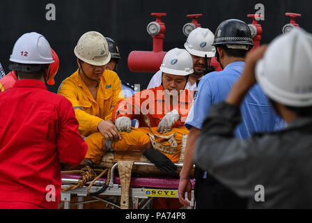 Haikou, China's Hainan Province. 21st July, 2018. Rescue members take part in a LNG carrier rescue drill held by Haikou maritime bureau in Chengmai County, south China's Hainan Province, July 21, 2018. Credit: Yang Guanyu/Xinhua/Alamy Live News Stock Photo