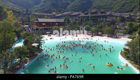 Jianhe, China's Guizhou Province. 20th July, 2018. Visitors have fun at a water park in Jianhe County, southwest China's Guizhou Province, July 20, 2018. Credit: Fang Peng/Xinhua/Alamy Live News Stock Photo