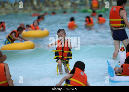 Jianhe, China's Guizhou Province. 20th July, 2018. Visitors have fun at a water park in Jianhe County, southwest China's Guizhou Province, July 20, 2018. Credit: Yang Jiameng/Xinhua/Alamy Live News Stock Photo