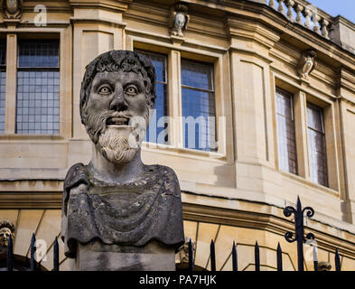 Scary stone head statue outside the Sheldonian Theatre in Oxford, Oxforshire, UK taken on 31 January 2018 Stock Photo