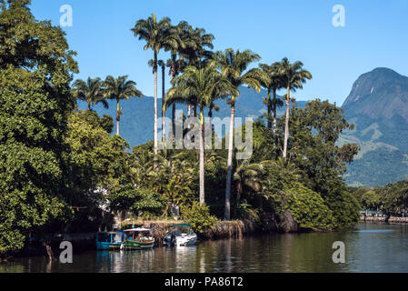 Paraty, Brazil - February 28, 2017: An iconic view of the canal and the colonial houses of the historic town Paraty, Rio de Janeiro state, Brazil Stock Photo