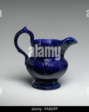 Pitcher. Culture: American. Dimensions: H. 7 3/4 in. (19.7 cm). Maker: Jersey City Pottery (1855-92). Date: ca. 1850. Museum: Metropolitan Museum of Art, New York, USA. Stock Photo