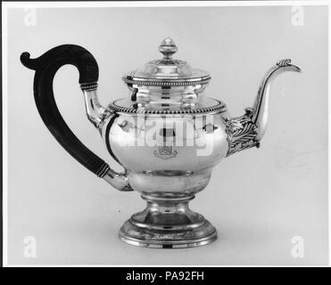 Teapot. Culture: American. Dimensions: Overall: 8 3/8 x 12 x 5 5/8 in. (21.3 x 30.5 x 14.3 cm); 33 oz. 16 dwt. (1050.8 g)  Foot: Diam. 4 1/4 in. (10.8 cm). Maker: Harvey Lewis (ca. 1783-1835). Date: 1827. Museum: Metropolitan Museum of Art, New York, USA. Stock Photo