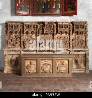 Altar Predella and Socle of Archbishop Don Dalmau de Mur y Cervelló. Artist: Francí Gomar (Spanish, Aragon, active by 1443-died ca. 1492/3). Culture: Spanish. Dimensions: 7 3/4 × 7 1/2 × 6 1/4 in. (19.7 × 19.1 × 15.9 cm). Date: ca. 1456-1458.  This massive structure, extending across five bays on two levels, was commissioned by don Dalmau de Mur y Cervelló, archbishop of Saragossa from 1434 to 1458/9, for an altar in the chapel of the archiepiscopal palace. The upper level (intended as the predella for the altarpiece or retable) contains five scenes: Saint Martin or Tours dividing his cloak wi Stock Photo