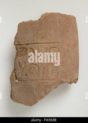 Pottery Fragment with Inscription. Culture: Coptic. Dimensions: Overall: 3 7/8 x 2 13/16 x 1 in. (9.8 x 7.2 x 2.6 cm). Date: 4th-7th century. Museum: Metropolitan Museum of Art, New York, USA. Stock Photo