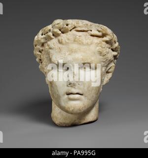 Marble head  of Herakles. Culture: Roman. Dimensions: H. 6 3/4 in. (17.1 cm). Date: 1st century A.D..  Small-scale copy of a Greek statue of the early  3rd century B.C.  The Greek hero, Herakles, is shown as a beardless young man with sideburns.  He has cauliflower ears-disfigured by boxing--and a victory wreath around his head. The head bears a strong resemblance to a group of Roman works, known as the Lenback type, that probably reflect more or less closely a Greek bronze statue of the early Hellenistic period. Museum: Metropolitan Museum of Art, New York, USA. Stock Photo