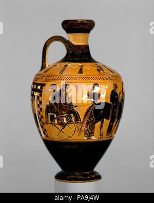 Terracotta lekythos (oil flask). Culture: Greek, Attic. Dimensions: H. 6 7/8 in. (17.5 cm). Date: ca. 550-530 B.C..  On the shoulder, women dancing between musicians playing flute and lyre  On the body, wedding procession  This is the earliest and most complete known representation of an Attic wedding. The bridal couple with the best man behind them sit in a cart drawn by two donkeys. A mule cart with four guests follows. Other members of the procession are on foot. The woman in the lead holds two torches, indicating that the scene takes place at night. The procession heads toward the bridegro Stock Photo