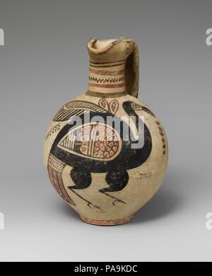 Terracotta jug. Culture: Cypriot. Dimensions: H. 7 15/16 in. (20.2 cm). Date: 750-600 B.C..  Standing bird. Museum: Metropolitan Museum of Art, New York, USA. Stock Photo