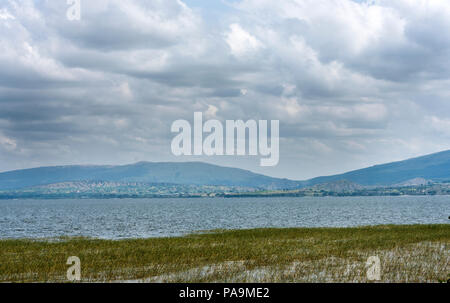 The Beautiful Awassa Lake surrounded by lush vegetation and mountains at a distance in South Addis Ababa Ethiopia Stock Photo