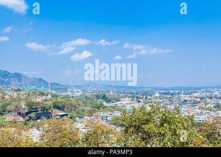 pagoda and Buddha statues in Wat Prathat Doi Wao at Mae Sai Chiang Rai Thailand. border crossing from Mai Sai to Tachilek Myanmar. Stock Photo