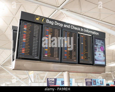 Bag drop and check in information display, Stansted Airport, UK Stock Photo