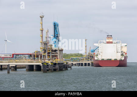 Gas transshipment terminal in harbor Rotterdam, biggest seaport of Europe Stock Photo