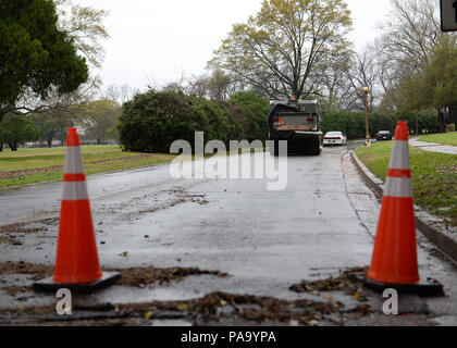 Several roads were closed due to flash flooding at Barksdale Air Force Base, La., March 9, 2016. Flash flooding swept the ArkLaTex region, where some areas saw more than 25 inches of rain over a three-day period. A state of emergency was declared in over 16 Louisiana parishes. Hundreds of Bossier families were forced to abandon their homes as mandatory evacuations were ordered for nine neighborhoods. (U.S. Air Force photo/Airman 1st Class Curt Beach) Stock Photo