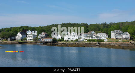 A view of homes along the inner harbor at Boothbay Harbor, Maine, USA Stock Photo