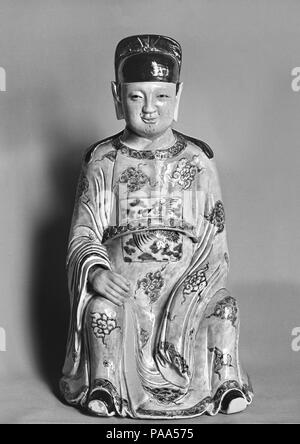 Figure with Court Headdress. Culture: China. Dimensions: H. 19 3/4 in. (50.2 cm). Museum: Metropolitan Museum of Art, New York, USA. Stock Photo