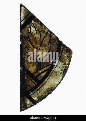 Glass Fragment. Culture: French. Dimensions: Overall: 5 1/2 x 4 in. (14 x 10.2 cm). Date: 14th century. Museum: Metropolitan Museum of Art, New York, USA. Stock Photo