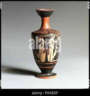 Terracotta lekythos (oil flask). Culture: Greek, Attic. Dimensions: Height: 5 3/4 in. (14.6 cm)  Diameter: 2 7/16 × 1 9/16 × 1 3/4 in. (6.1 × 4 × 4.4 cm). Date: early 5th century B.C..  Women dancing before an image of Dionysos. Museum: Metropolitan Museum of Art, New York, USA. Stock Photo