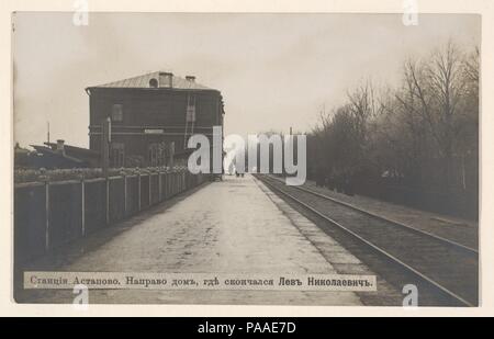 Astapovo Train Station, On the Right is the House in Which Lev Nikolayevich (Tolstoy) Died. Artist: Aleksey Ivanovich Saveliev (Russian, 1883-1923). Dimensions: Image: 8.9 x 13.3 cm (3 1/2 x 5 1/4 in.). Date: 1910.  These six photo-postcards show various places and moments surrounding the death and burial of Leo Tolstoy. In November 1910 the eighty-two-year-old novelist walked away from his great wealth to devote himself to Christian charity and died in a stationmaster's house after falling ill on a train. Tolstoy's death was of tremendous national importance, and how he was to be mourned-whet Stock Photo