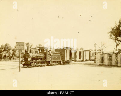203 Port Said Railway Company - 4-4-0 steam locomotive No. V2 (SACM Graffenstaden, 1893) and a passenger train Stock Photo