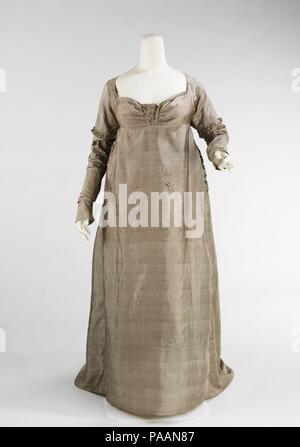 Dress. Culture: American. Date: ca. 1805. The Empire silhouette is readily identified with its origins in the chiton of ancient Greco-Romans, which was a tubular garment draped from the shoulders and sometimes Dress. Culture: American. Date: ca. 1805. The Empire silhouette is readily identified with its origins in the chiton of ancient Greco-Romans, which was a tubular garment draped from the shoulders and sometimes
