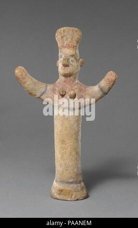 Standing female figurine of the 'goddess with uplifted arms' type. Culture: Cypriot. Dimensions: H. 7 1/4 in. (18.4 cm). Date: ca. 600-480 B.C..  The cylindrical body is handmade and solid.  The entire figure shows considerable remains of paint. Museum: Metropolitan Museum of Art, New York, USA. Stock Photo