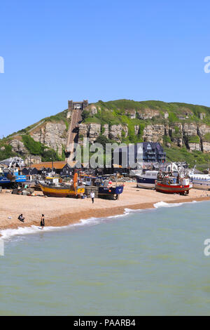 The beach and fishing boats at Hastings, the historical, coastal town on the south coast, in East Sussex, UK Stock Photo