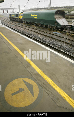 Freightliner class 66 diesel locomotive 66590 waiting at red signal at Carlisle station, UK. Stock Photo