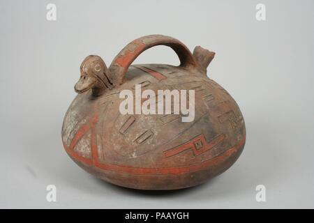 Double Spout and Bridge Bottle with Bird. Culture: Paracas. Dimensions: Height 5-5/8 in.. Date: 5th-2nd century B.C.. Museum: Metropolitan Museum of Art, New York, USA. Stock Photo