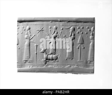 Cylinder seal. Culture: Assyrian. Dimensions: 1.54 in. (3.91 cm). Date: ca. 9th-8th century B.C.. Museum: Metropolitan Museum of Art, New York, USA. Stock Photo