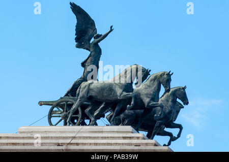 The goddess Victoria riding on the  Quadriga dell'Unita on the top of the Altar of the Nation at the National Monument to Victor Emmanuel II in Rome. Stock Photo