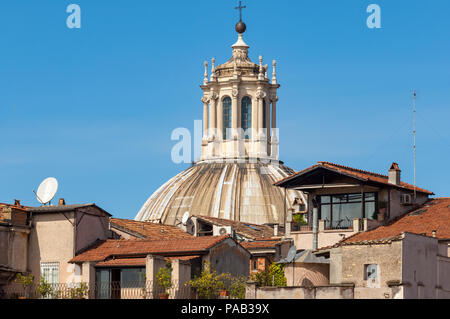 The dome of Santissimo Nome di Maria dominates the roofscape above Trajan's Market in Rome Stock Photo