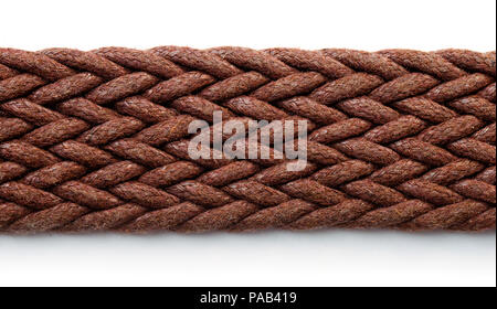 Close up of brown woven textile belt on white background Stock Photo