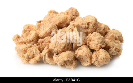 Pile of dry soya chunks isolated on white Stock Photo