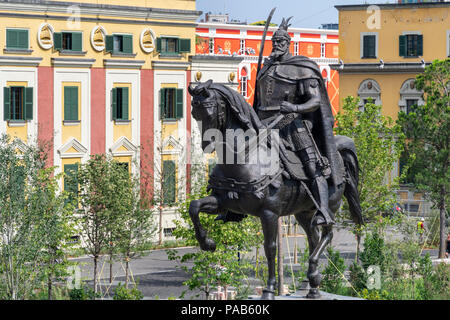 The Statue of Skanderbeg at the centre of Skanderbeg Square with the Government offices in the background, Tirana, Albania, Stock Photo