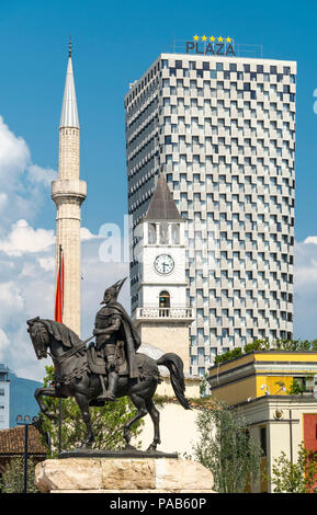 Four of Tirana's landmarks -  The Statue of Skanderbeg, The Et'hem Bey Mosque, the clock tower and the Plaza Hotel seen from  Skanderbeg Square Tirana Stock Photo