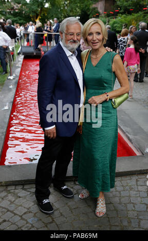 german television and news presenter petra gerster and her husband german publicist christian nurnberger pose for the cameras before the premiere of the nibelungenfestspielen in worms actors politicians and other vips attended