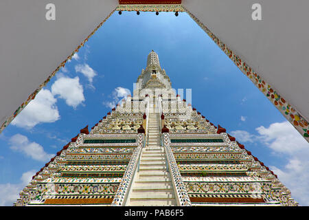 View over Wat Arun Temple through the gate inside, in Bangkok, Thailand. Stock Photo