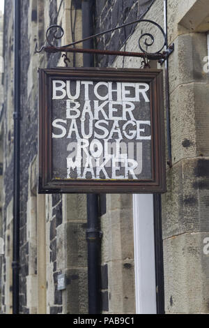 Butcher baker sausage roll maker old rusted sign Stock Photo