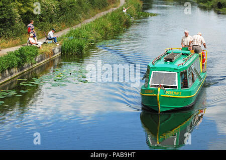 Canal Boat Egremont   operated by Chichester Canal Trust  approaching Hunston Bridge from Chichester Summer  West Sussex Stock Photo