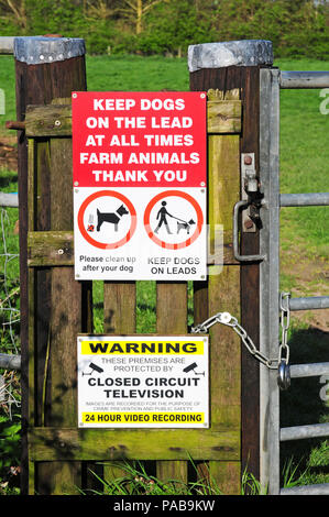 Notices to public on a public footpath. Stock Photo