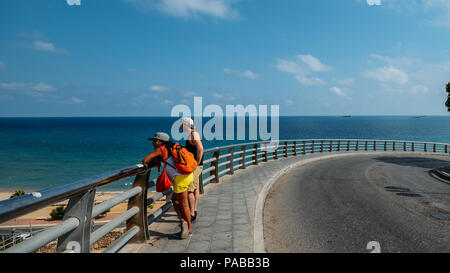 Tarragona, Spain - July 11, 2018: Tourists overlooking the pristine Costa Daurada at Tarragon's Mediterranean Balcony Stock Photo