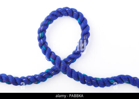 Loop of decorative braided curtain blue cord on white background Stock Photo