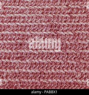 Large knitted red knitwear texture closeup Stock Photo